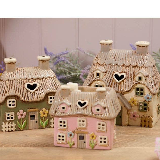 Village Pottery Tealight Large Thatched Cottage with Embossed Flowers and Green Door - Arriving in Store late May