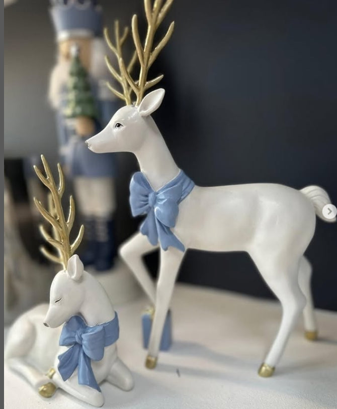 Sitting White Reindeer Blue Bow - October Drop